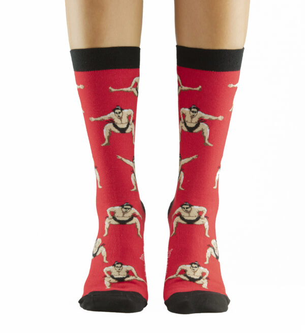 Chaussettes fantaisie avec design de sumos et fond rouge