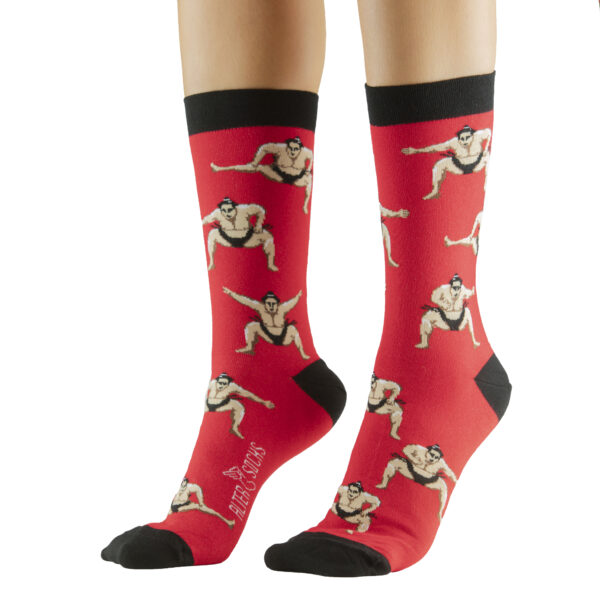 Chaussettes fantaisie avec design de sumos et fond rouge